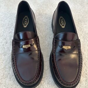 Tod's Leather Loafers- Rich wine color. Size 37.5 and never worn!!!